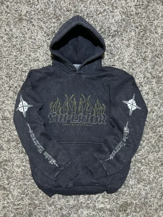 A hooded sweatshirt laid out as a product reference.