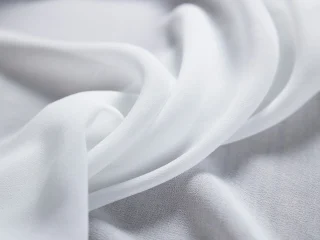 Close view of chiffon showing its fine, open weave.