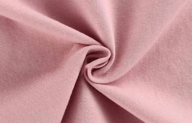 Soft pink modal jersey in loose folds.