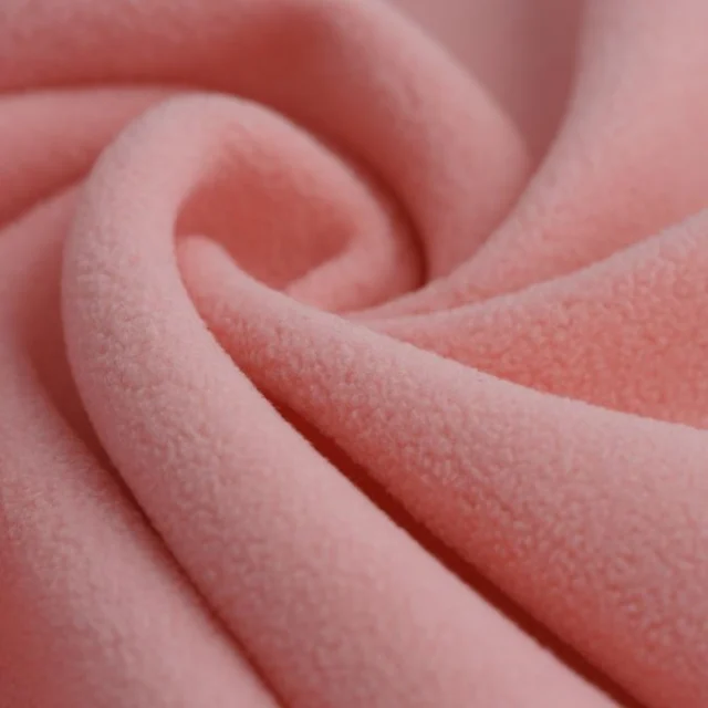 Close view of a polyester fleece surface.