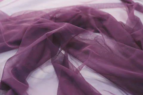 Sheer purple chiffon in loose folds.