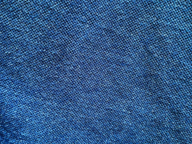 Close view of blue denim showing its diagonal twill.