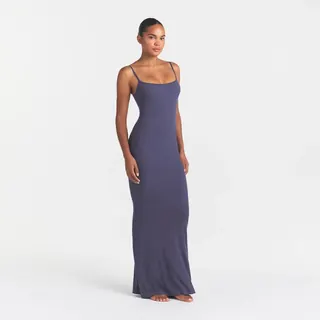 A blue-gray rib-knit bodycon maxi dress with thin straps.