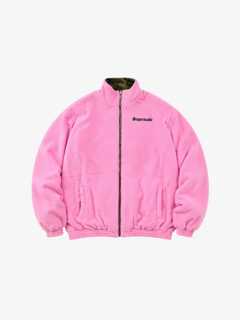 Bright pink fleece face of a reversible camouflage jacket with a full zip and standing collar.