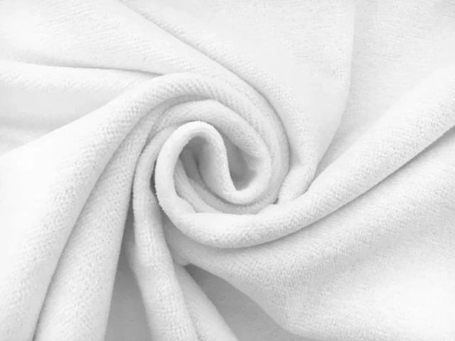 White cotton terry velour fabric in a swirl.