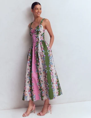 A floral striped fit-and-flare midi dress with a strappy bodice and a full skirt.