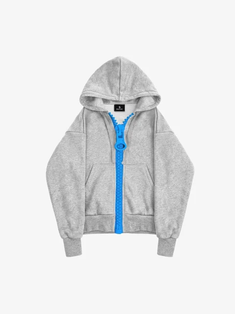 A gray boxy zip-up hoodie with a bright blue zip.