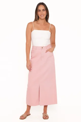 A pink straight denim midi skirt with a front split, zip fly and jeans pockets.