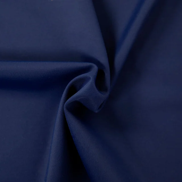 A fold of navy stretch swim fabric.