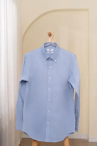 A button-down shirt with a placket front.